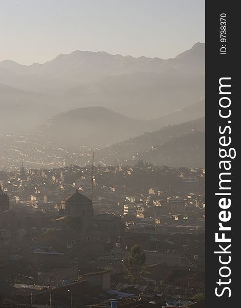 Town of Cuzco in Peru on a misty morning. Town of Cuzco in Peru on a misty morning