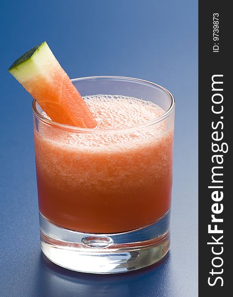 Refreshing cold watermelon juice isolated over white