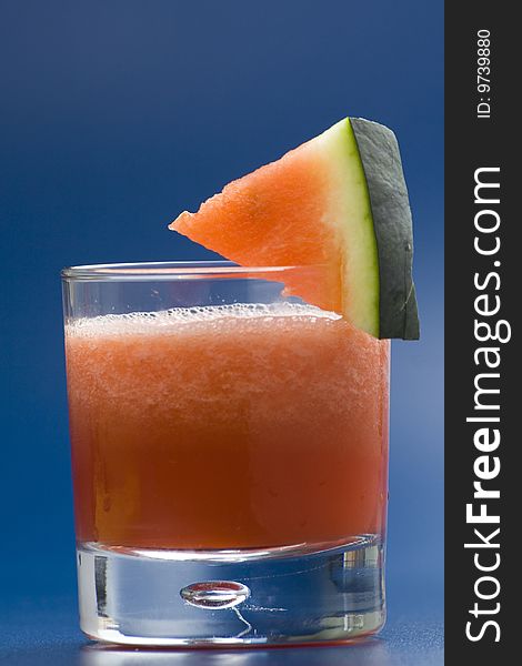 Refreshing cold watermelon juice isolated over white
