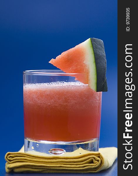 Refreshing cold watermelon juice isolated over white