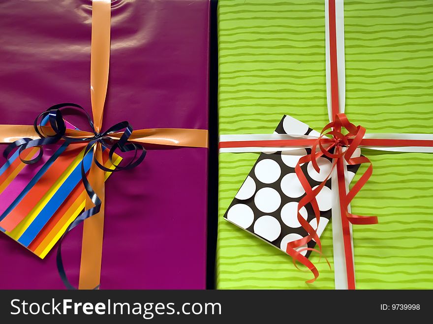 Colorful present shiny boxes with ribbon (close-up). Colorful present shiny boxes with ribbon (close-up)