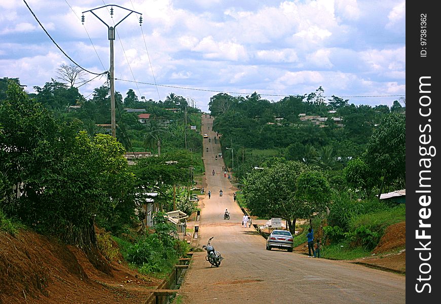 A street leading up a hill in Sangmelima, Cameroon - a town of 50000 in the middle of the jungle. A street leading up a hill in Sangmelima, Cameroon - a town of 50000 in the middle of the jungle.