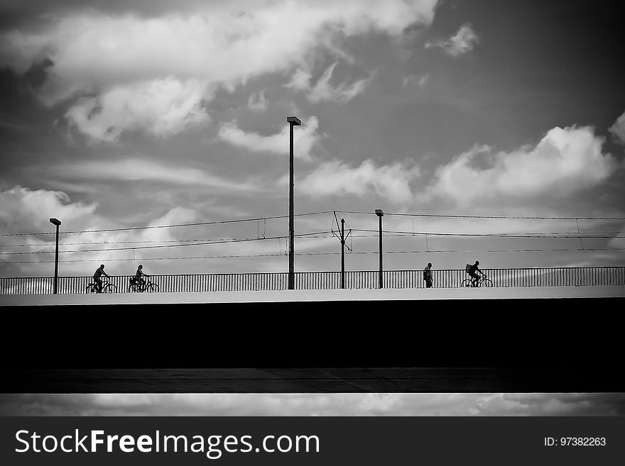 People Riding On Bicycle During Daytime