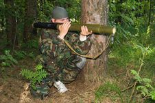 Man In A Camouflage Shoots From A Grenade Launcher Stock Image Man In A Camouflage Shoots From A Grenade Launcher Stock Image