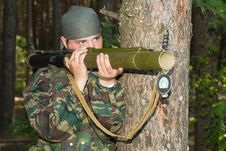 Man In A Camouflage Shoots From A Grenade Launcher Stock Photos Man In A Camouflage Shoots From A Grenade Launcher Stock Photos