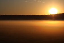 Sunrise Over A Foggy Lake. Stock Photos
