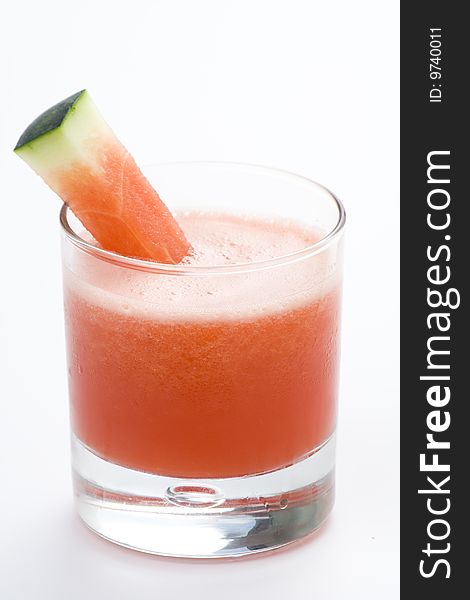 Refreshing cold watermelon juice isolated over white