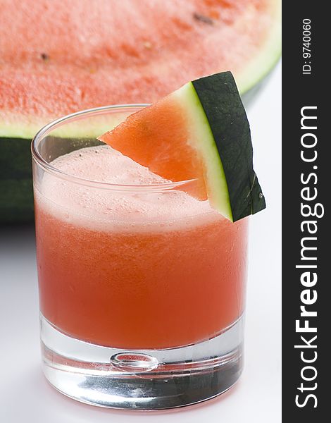 Refreshing cold watermelon juice isolated over white