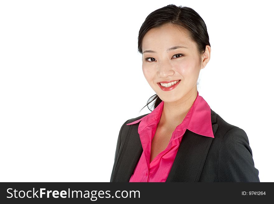 An attractive businesswoman posing in a studio