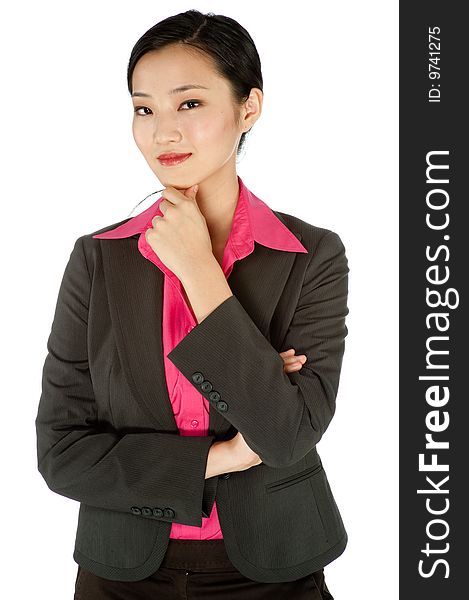 An attractive businesswoman posing in a studio