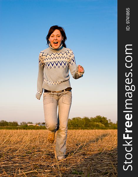 Happy Young Woman Running