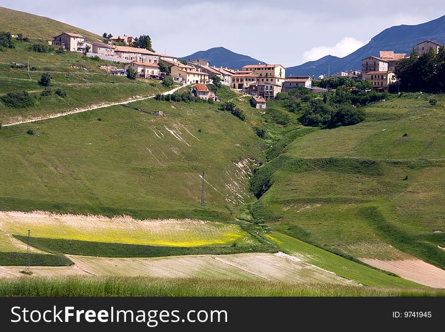 Photo of the country village at the top of the hill