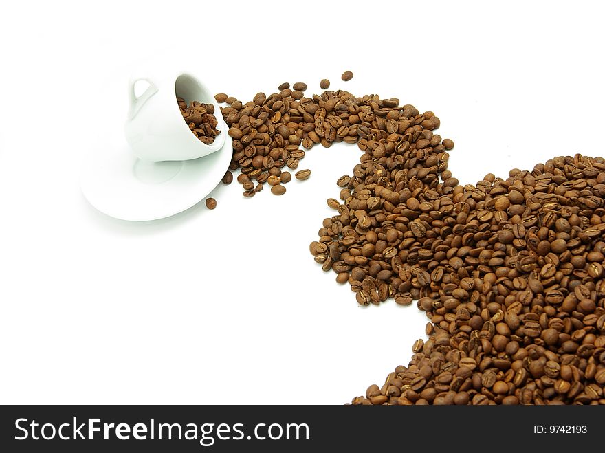 Coffee beans in a white cup. Coffee beans in a white cup