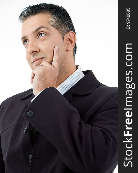 Portrait of thinking businessman with white background