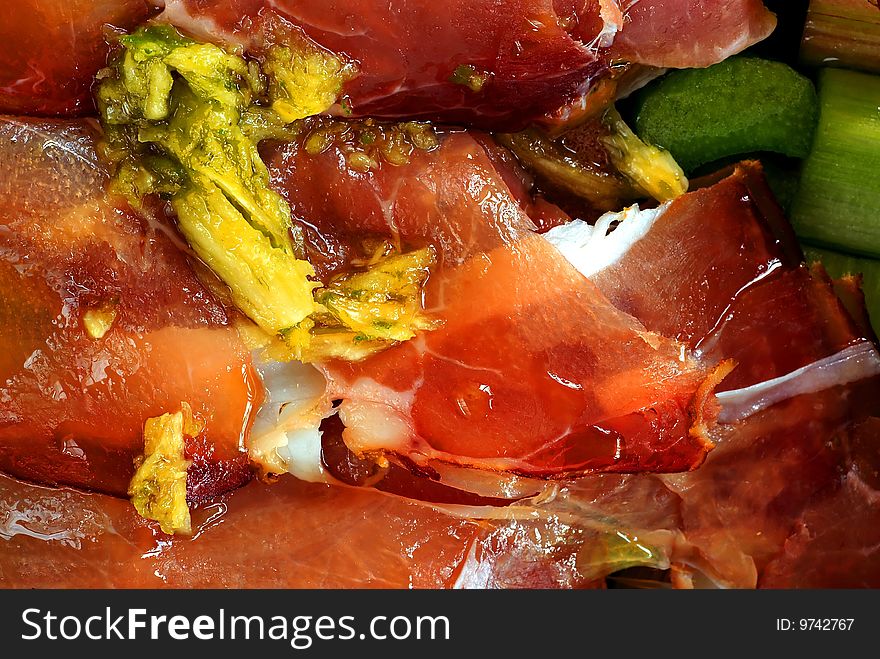 Detail of fresh prosciutto before baking with oil, herbs, garlic. Detail of fresh prosciutto before baking with oil, herbs, garlic