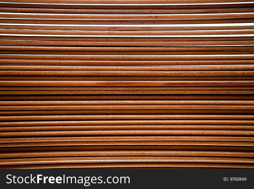 Beautiful wooden jalousie at a window. Beautiful wooden jalousie at a window