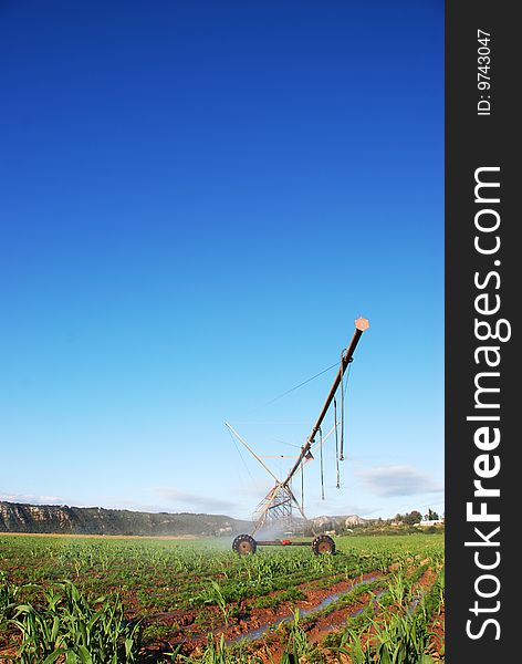 Irrigation system watering a farm. Irrigation system watering a farm