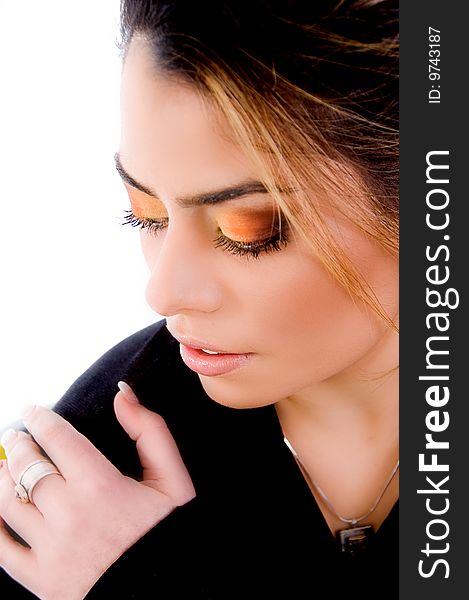 Top view of young female's eye shadow on an isolated white background