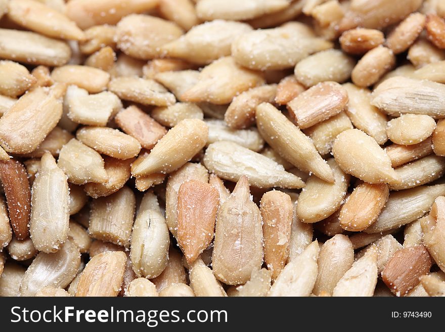 A macro shot of a heap of sunflower seeds. A macro shot of a heap of sunflower seeds.