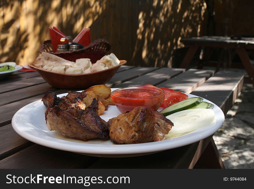 Served meat grill on the plate