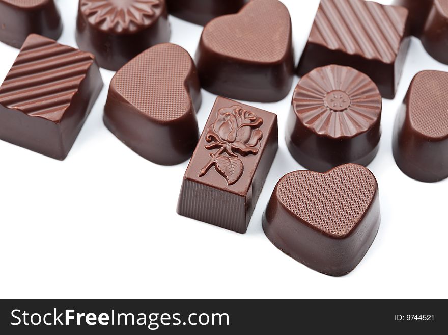 Chocolate candies isolated over white