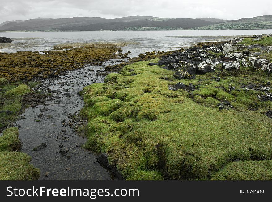 Landscape by the scottish coast with river and rocks. Landscape by the scottish coast with river and rocks