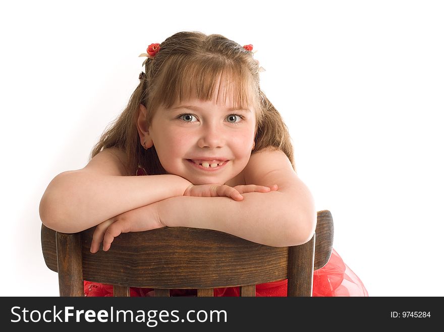 Child On Brown Chair