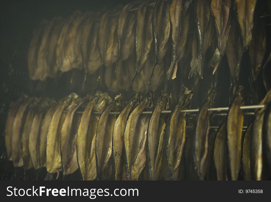 Fish being smoked in a smoke house in Mallaig, Scotland. Fish being smoked in a smoke house in Mallaig, Scotland