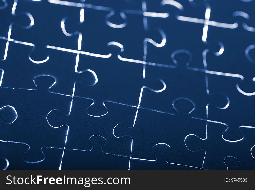 Closeup of abstract blue puzzle background. Closeup of abstract blue puzzle background