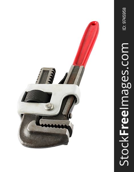 Close up of a pipe wrench isolated on white background.