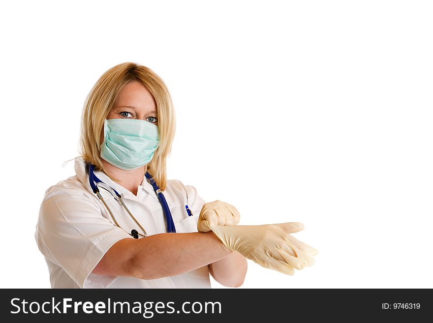 Doctor with respirator adducts her latex gloves. Doctor with respirator adducts her latex gloves