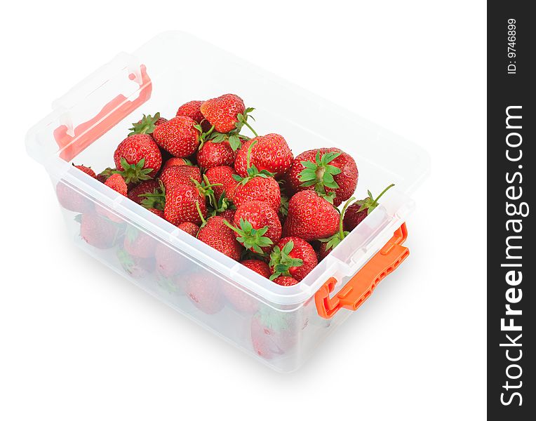 Strawberries in a plastic box. Isolated over white.