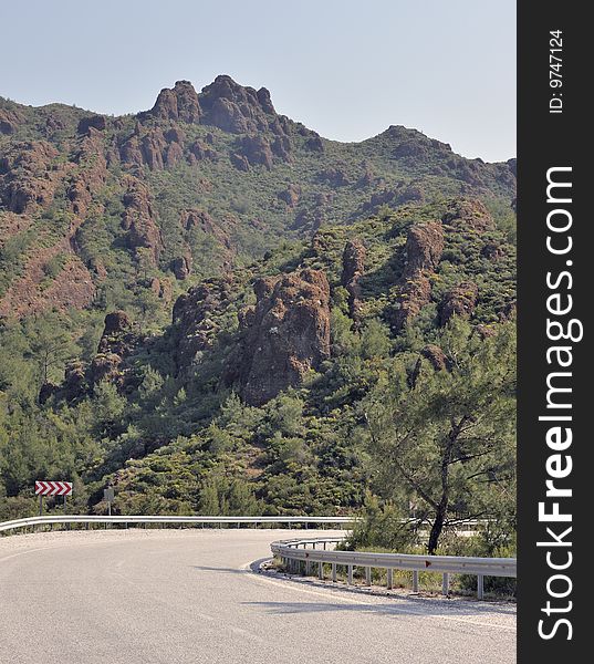 Bend in road through mountains