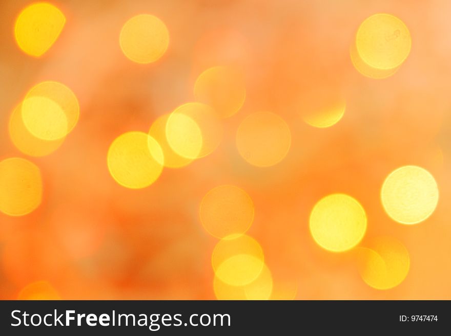 Bright blurred bokeh background of warm tonality. Bright blurred bokeh background of warm tonality