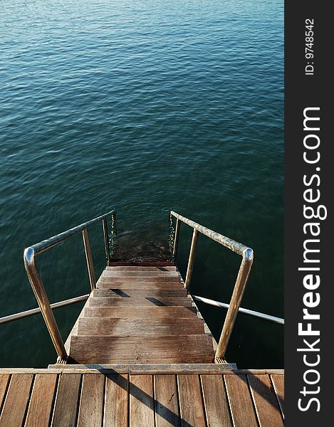 Wooden steps in the sea