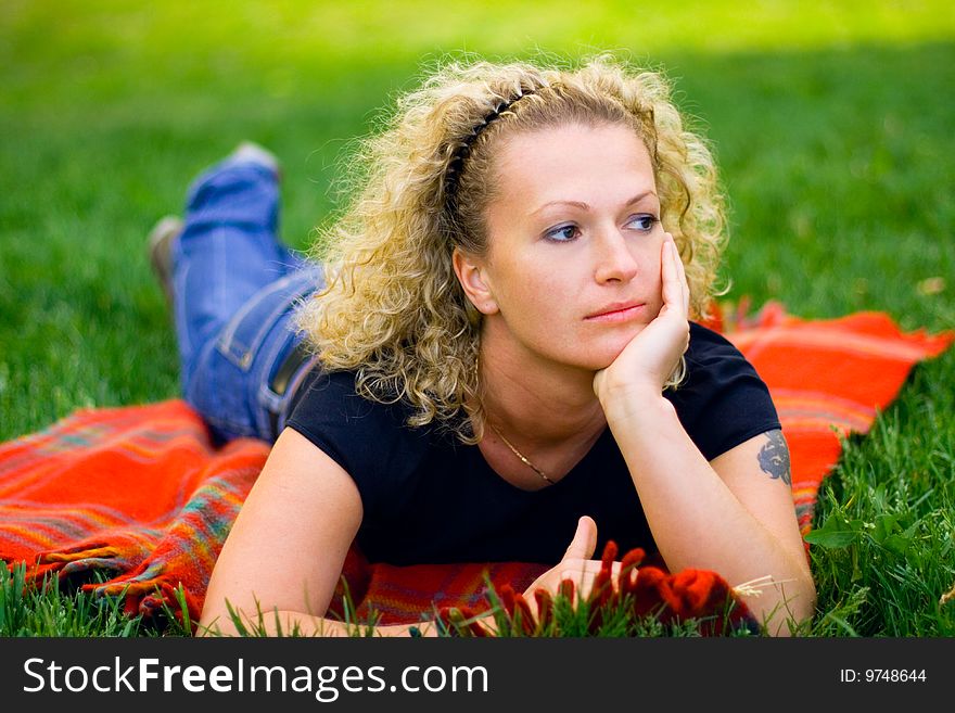 Woman On Green Grass