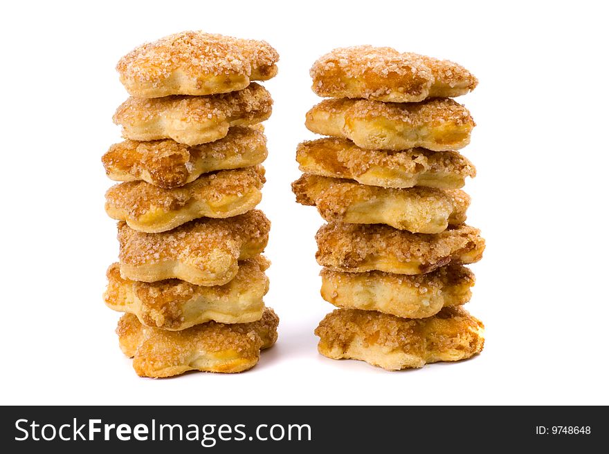 Two stacks of cookies on white background
