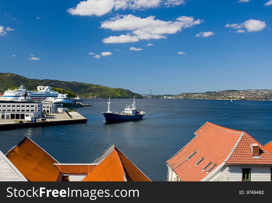 Ship enters the harbor. Bergen, Norway.