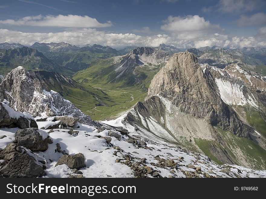 Looking out across the Austrian Alps from the summit of Valluga on a bright, summer day. Looking out across the Austrian Alps from the summit of Valluga on a bright, summer day.