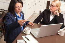Businesswomen Working On The Laptop Stock Photo Businesswomen Working On The Laptop Stock Photo