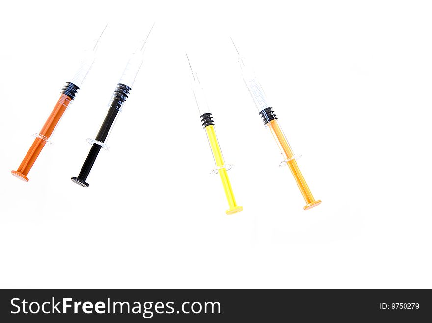 Color syringe on white  background