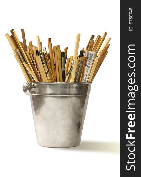 Various chopsticks in bucket for champagne isolated on white.clipping path inside