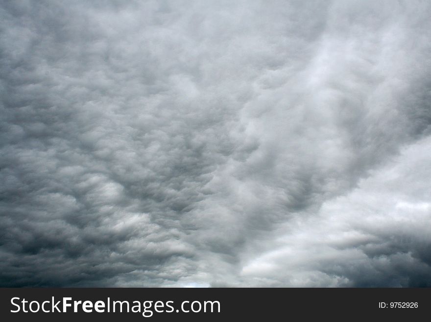 A cloud pattern forms a vee up in the sky. A cloud pattern forms a vee up in the sky