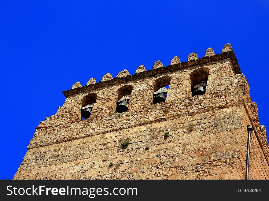 Bell tower on blue sky, Monreale cathedral