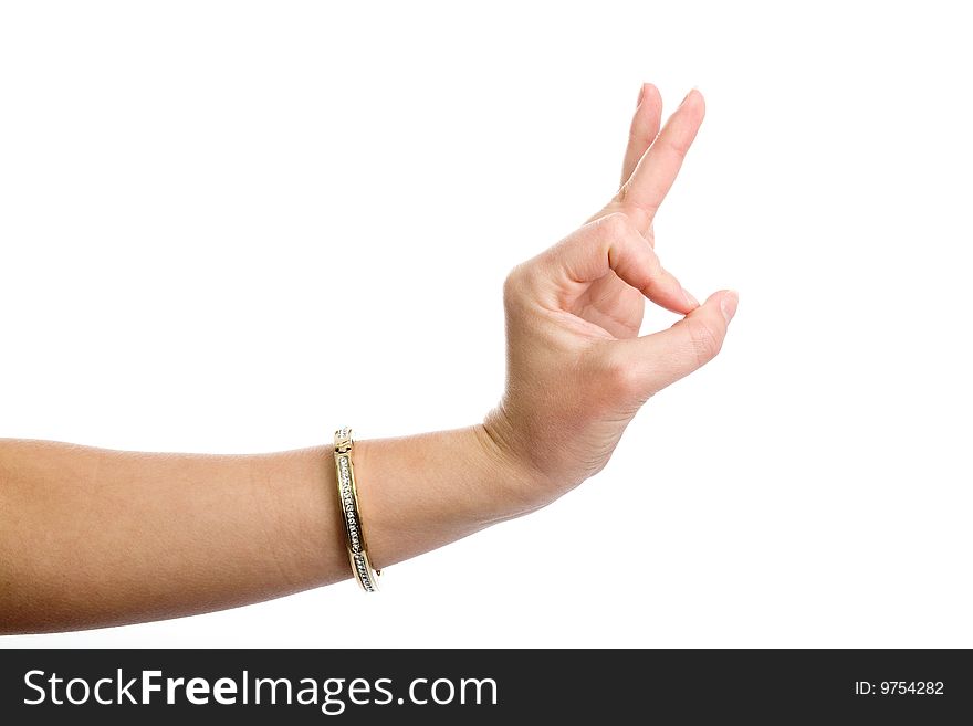 Female hand demonstrating OK gesture on the white background. Female hand demonstrating OK gesture on the white background