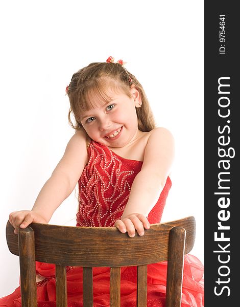 Girl on brown chair