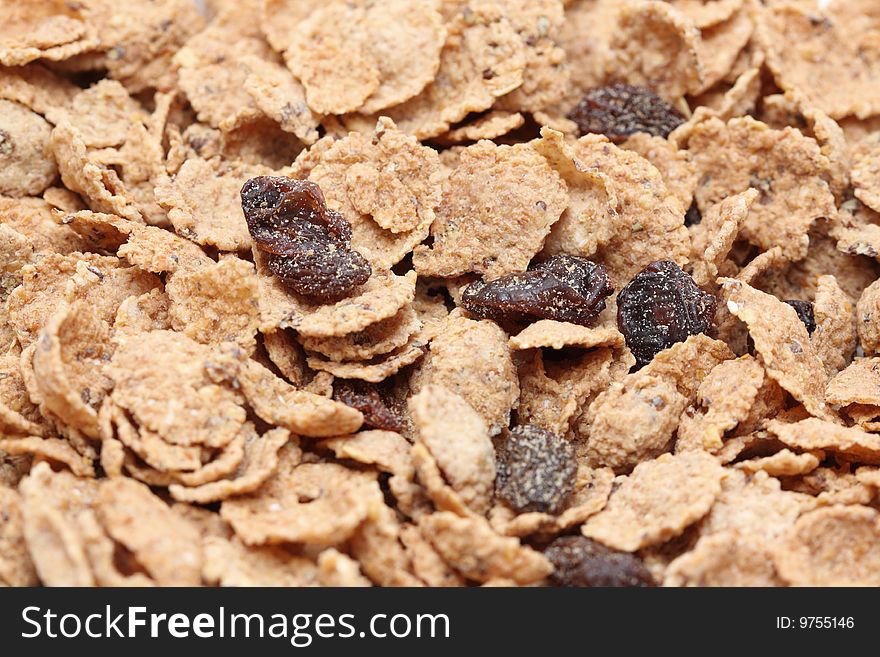 A macro shot of a cereal with raisins.