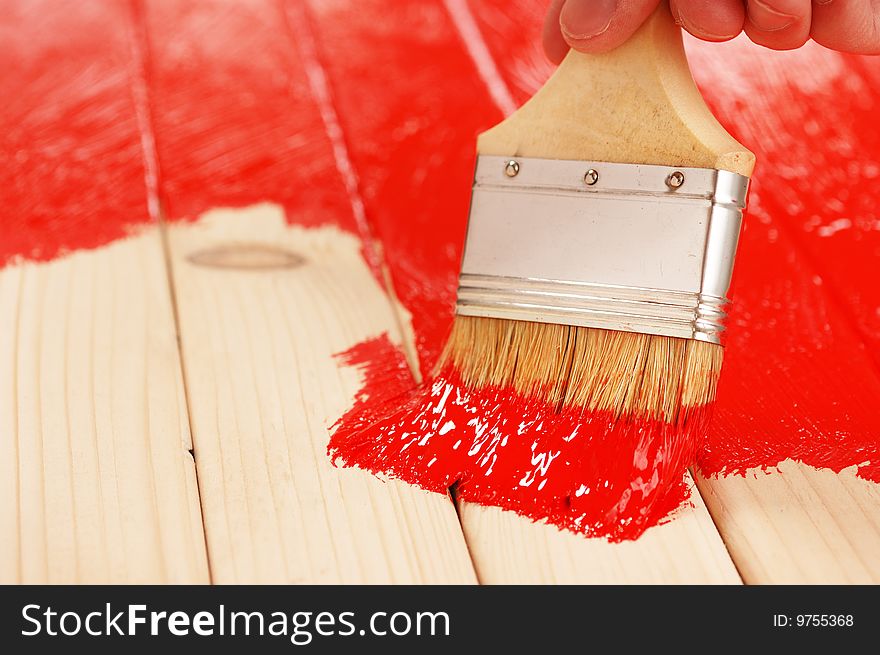 Painting Wooden Surface With Red Paint