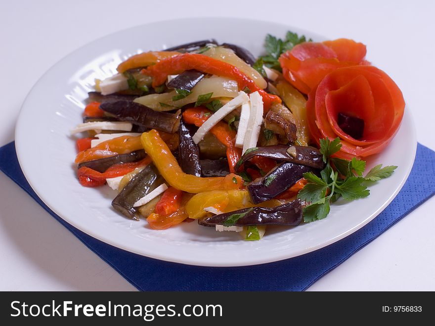 Salad of braised eggplant with pepper, filled cheese and oil. Salad of braised eggplant with pepper, filled cheese and oil