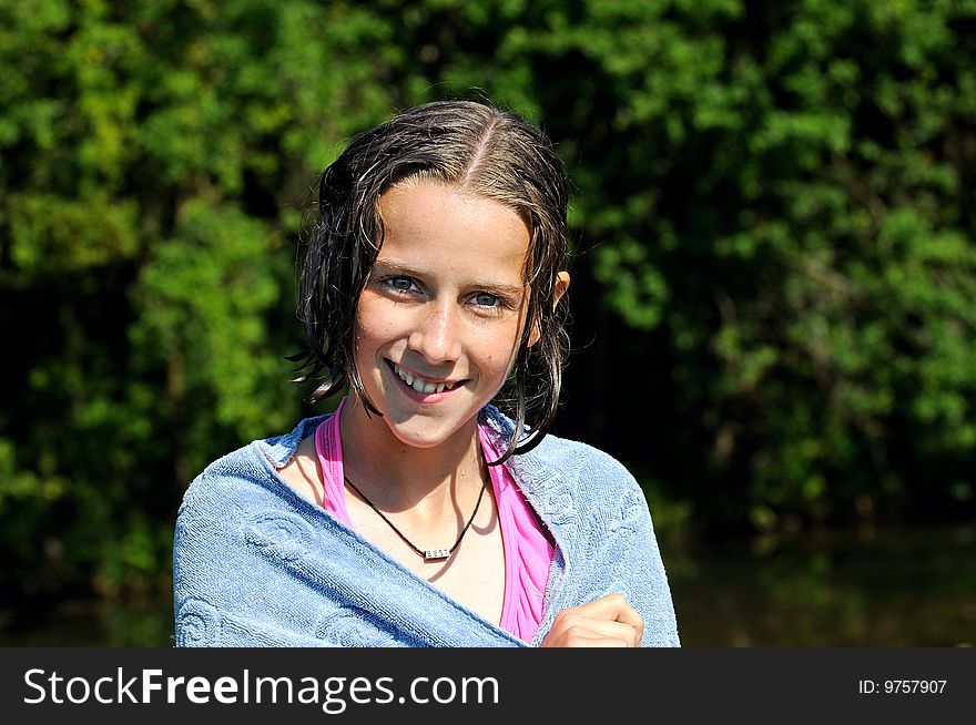 Girl smiling after a swim